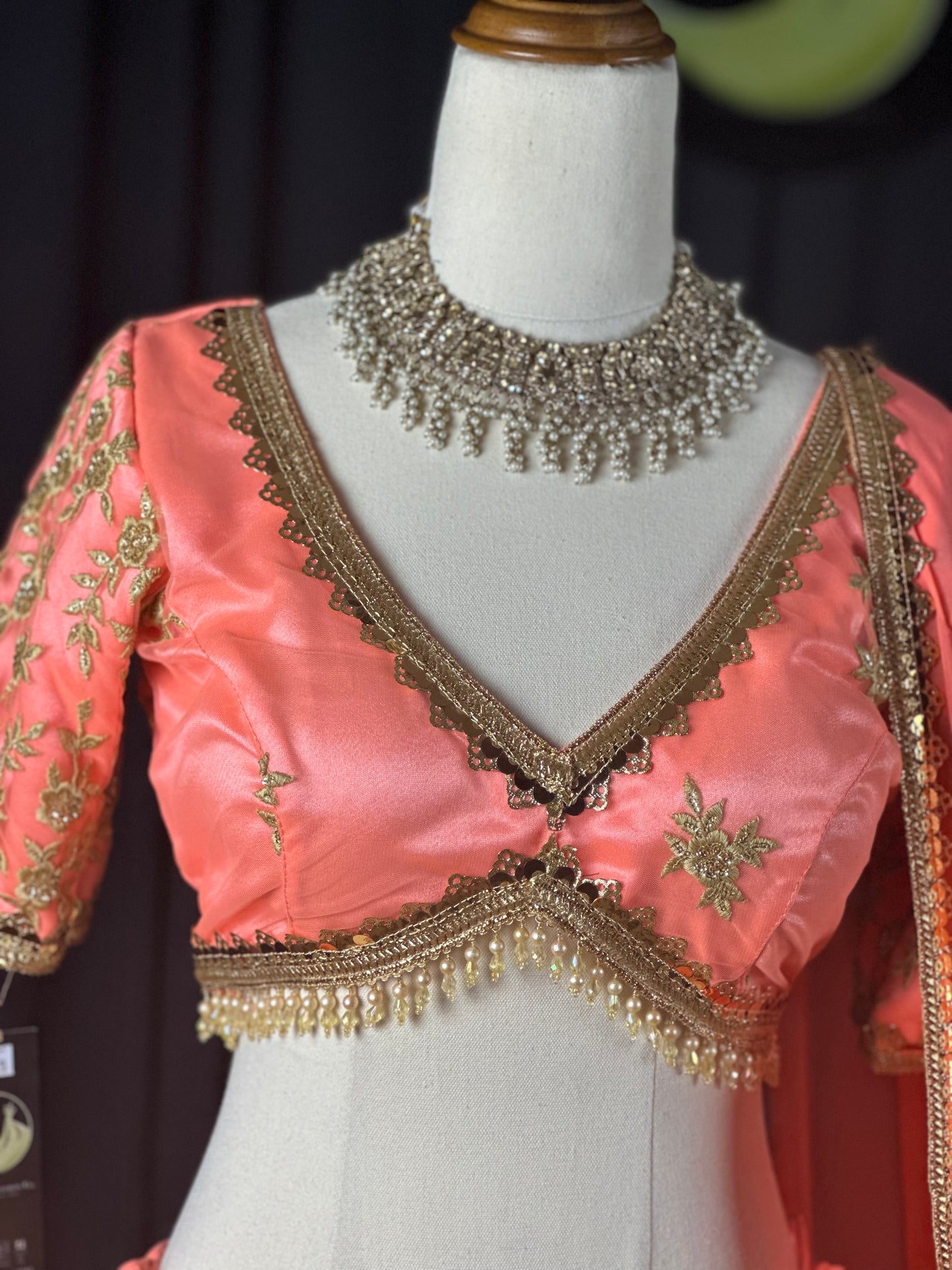Boutique Peach Pink Embroidered Silk Lehenga Set with Gold Detailing