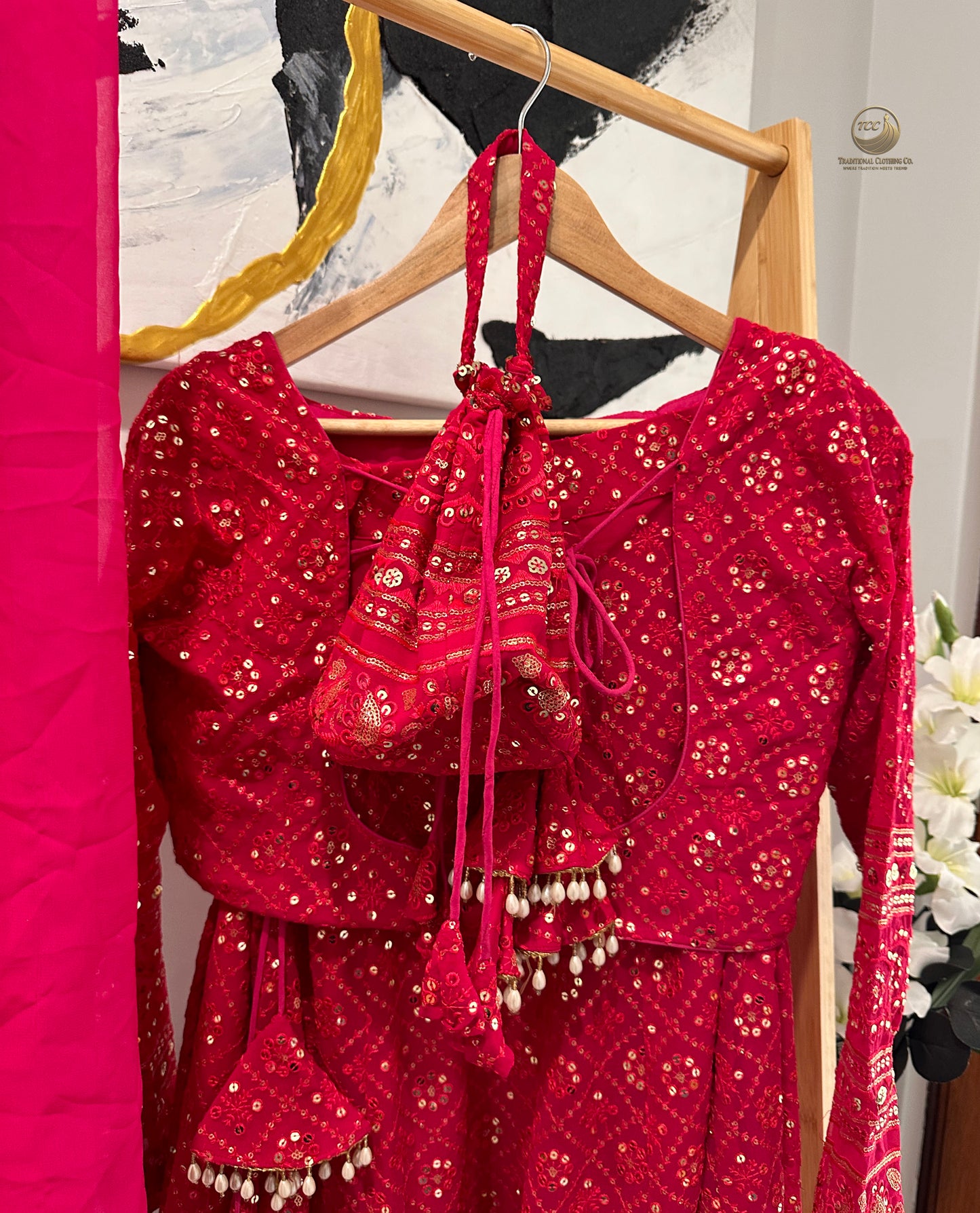 Elegant Red Embroidered Lehenga Choli with Dupatta & Matching Potli Bag – Bridal & Festive Wear
