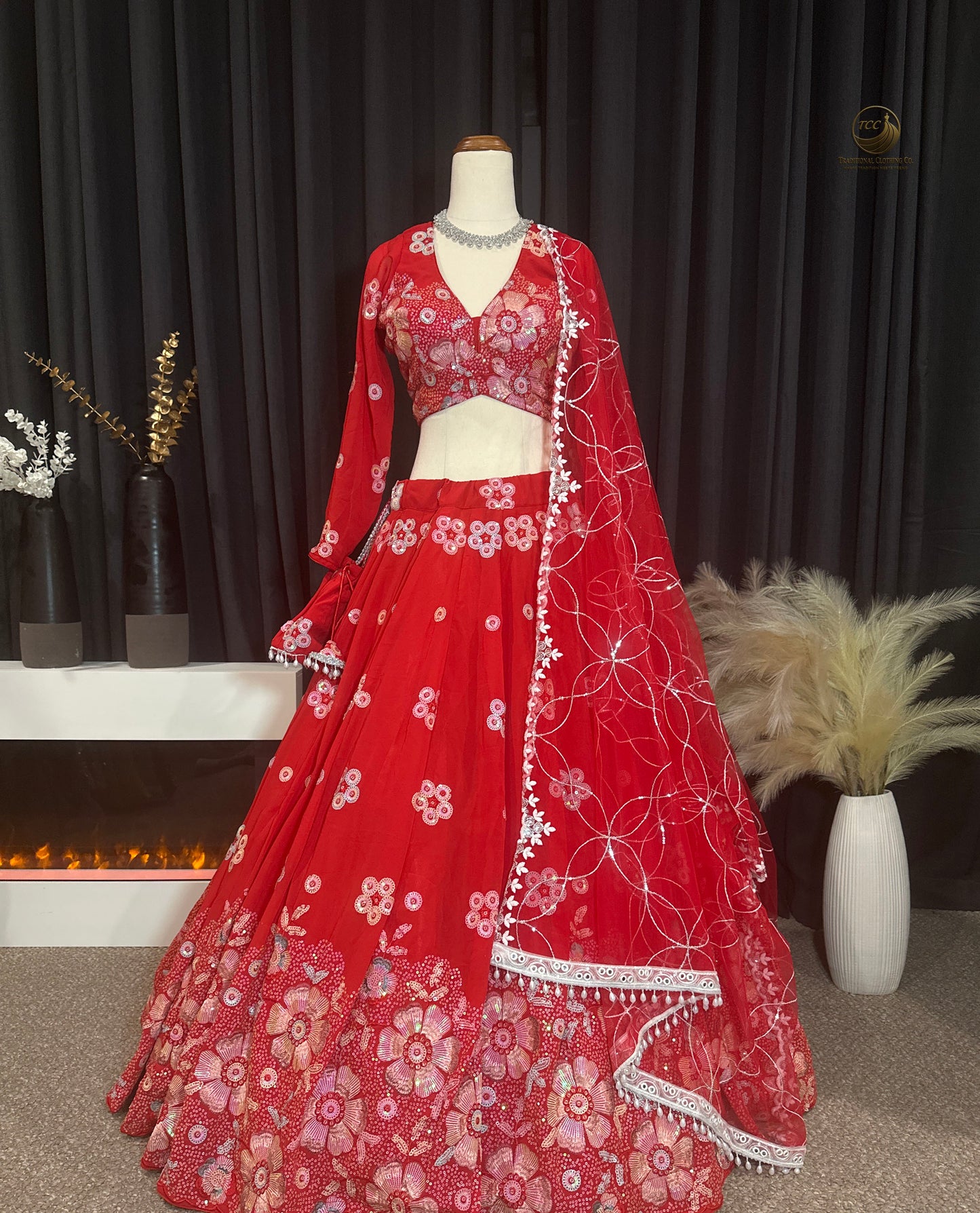 RED BRIDAL THREAD AND SEQUIN EMBROIDERED LEHENGA WITH BOUTIQUE BLOUSE, SEQUIN EMBROIDERED DUPATTA AND MATCHING POTLI