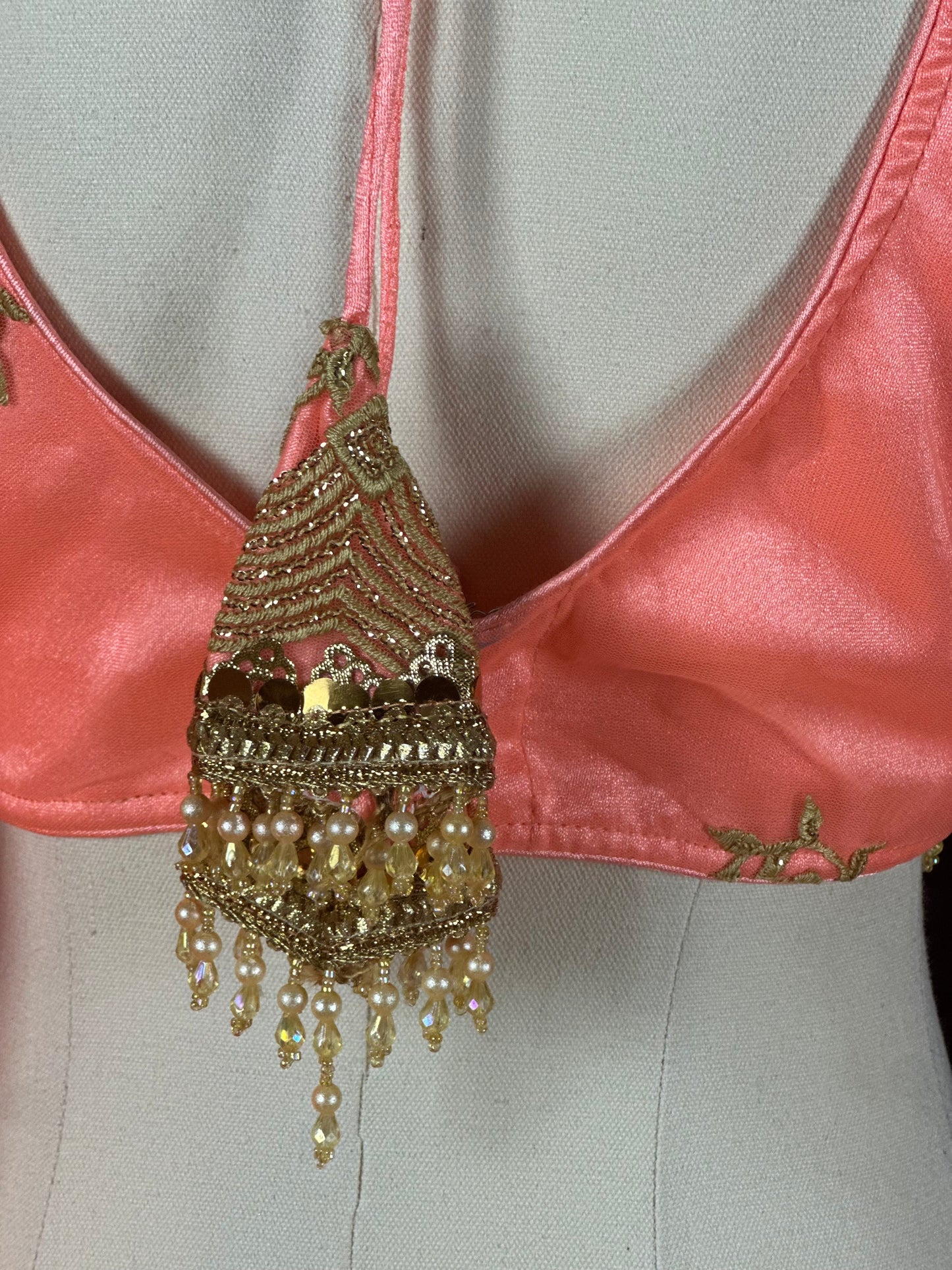 Boutique Peach Pink Embroidered Silk Lehenga Set with Gold Detailing