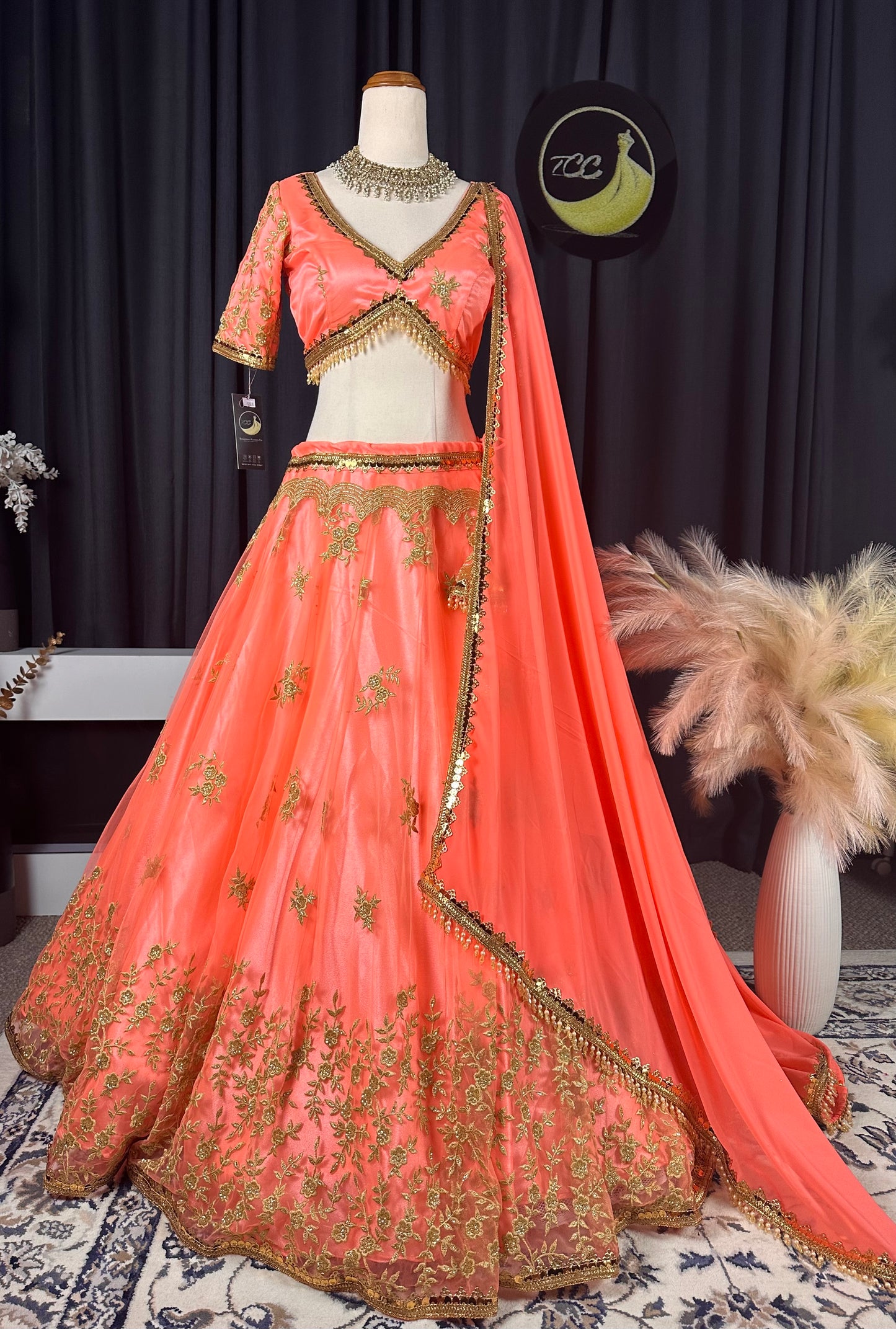 Boutique Peach Pink Embroidered Silk Lehenga Set with Gold Detailing