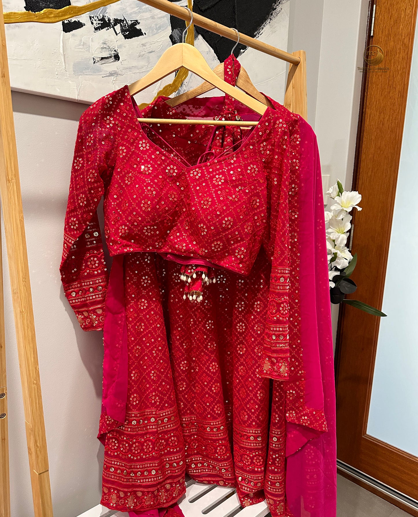 Elegant Red Embroidered Lehenga Choli with Dupatta & Matching Potli Bag – Bridal & Festive Wear