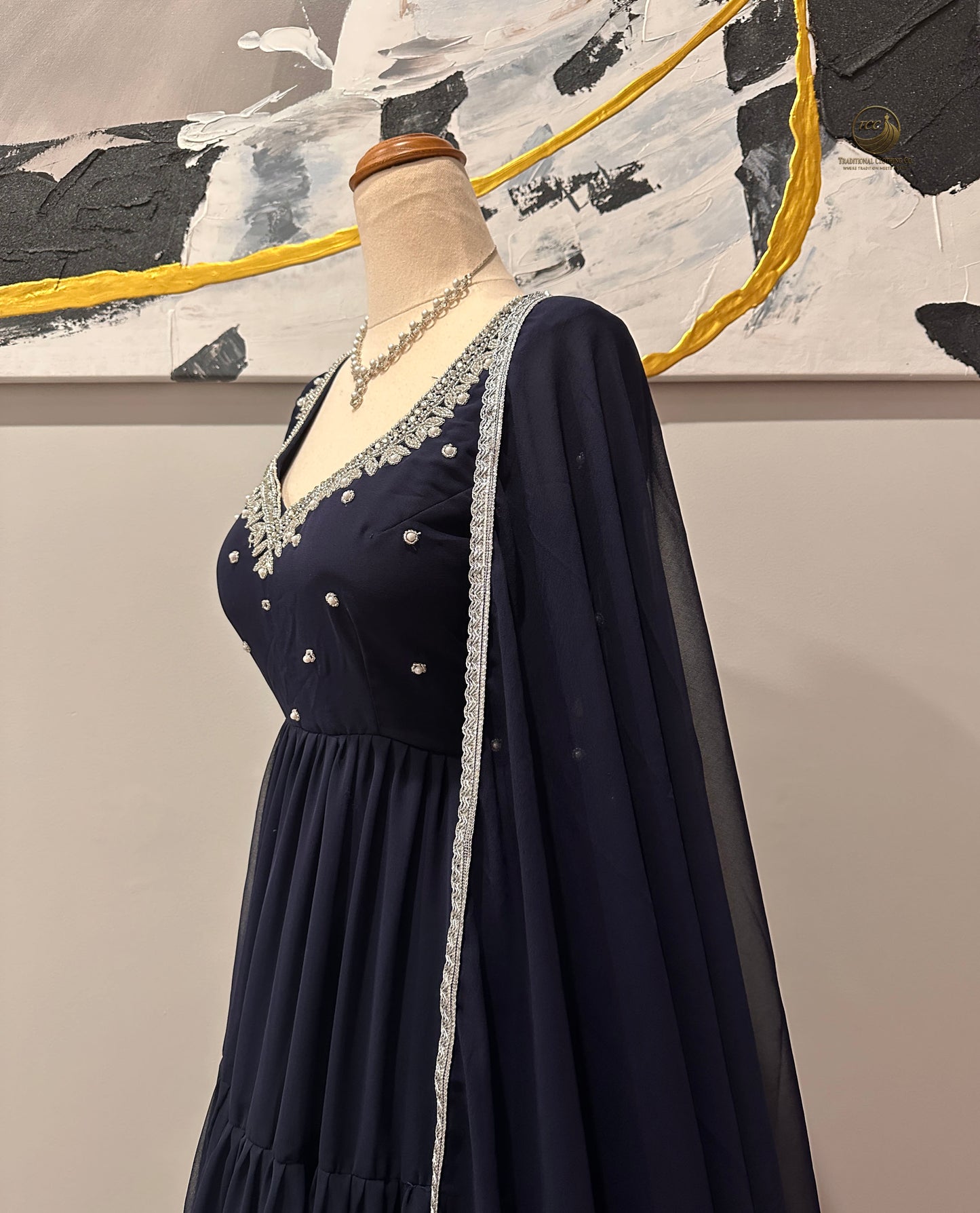 Regal Navy Blue Tiered Lehenga Set with Crisscross Back & Sheer Sleeve โ 3-Piece Festive Ensemble