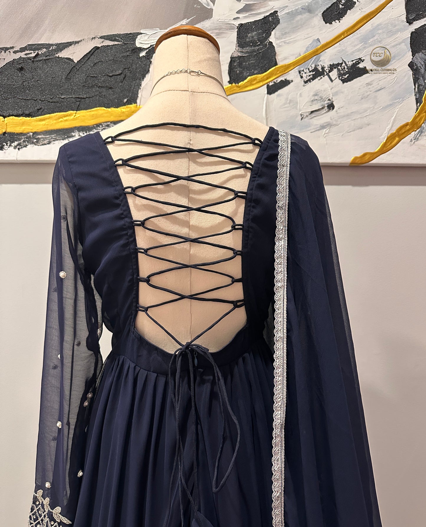 Regal Navy Blue Tiered Lehenga Set with Crisscross Back & Sheer Sleeve โ 3-Piece Festive Ensemble