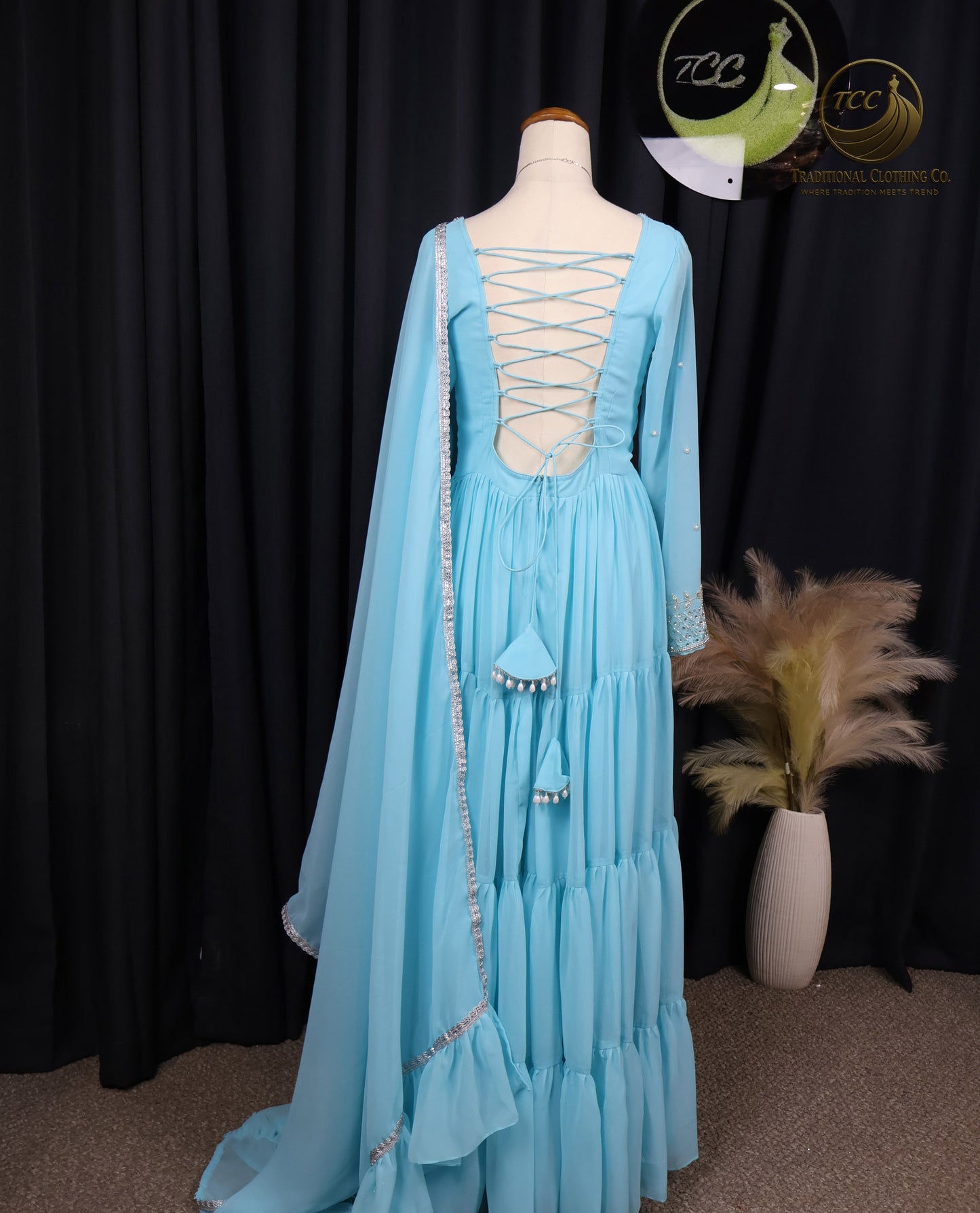 Elegant Light Blue Layered Gown with Lace-Up Back & Tassel Detailing – Festive & Occasion Wear