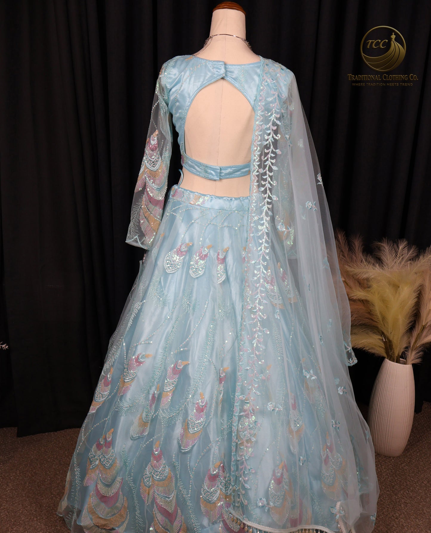 Elegant Light Blue Lehenga Choli with Intricate Peacock Embroidery – Traditional Festive Wear