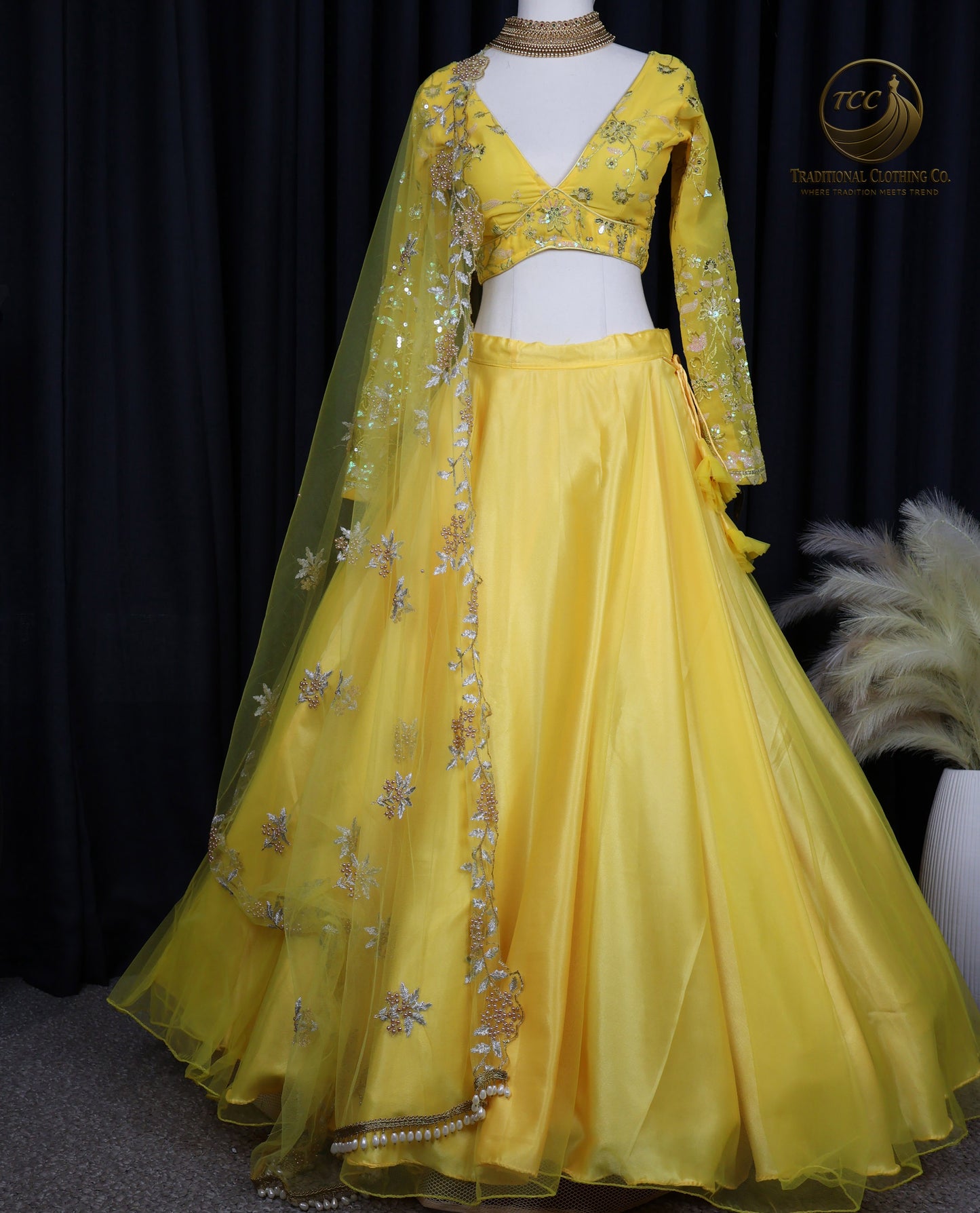 Yellow Floral Embroidered Lehenga Choli with Sheer Dupatta – Elegant Traditional Wear