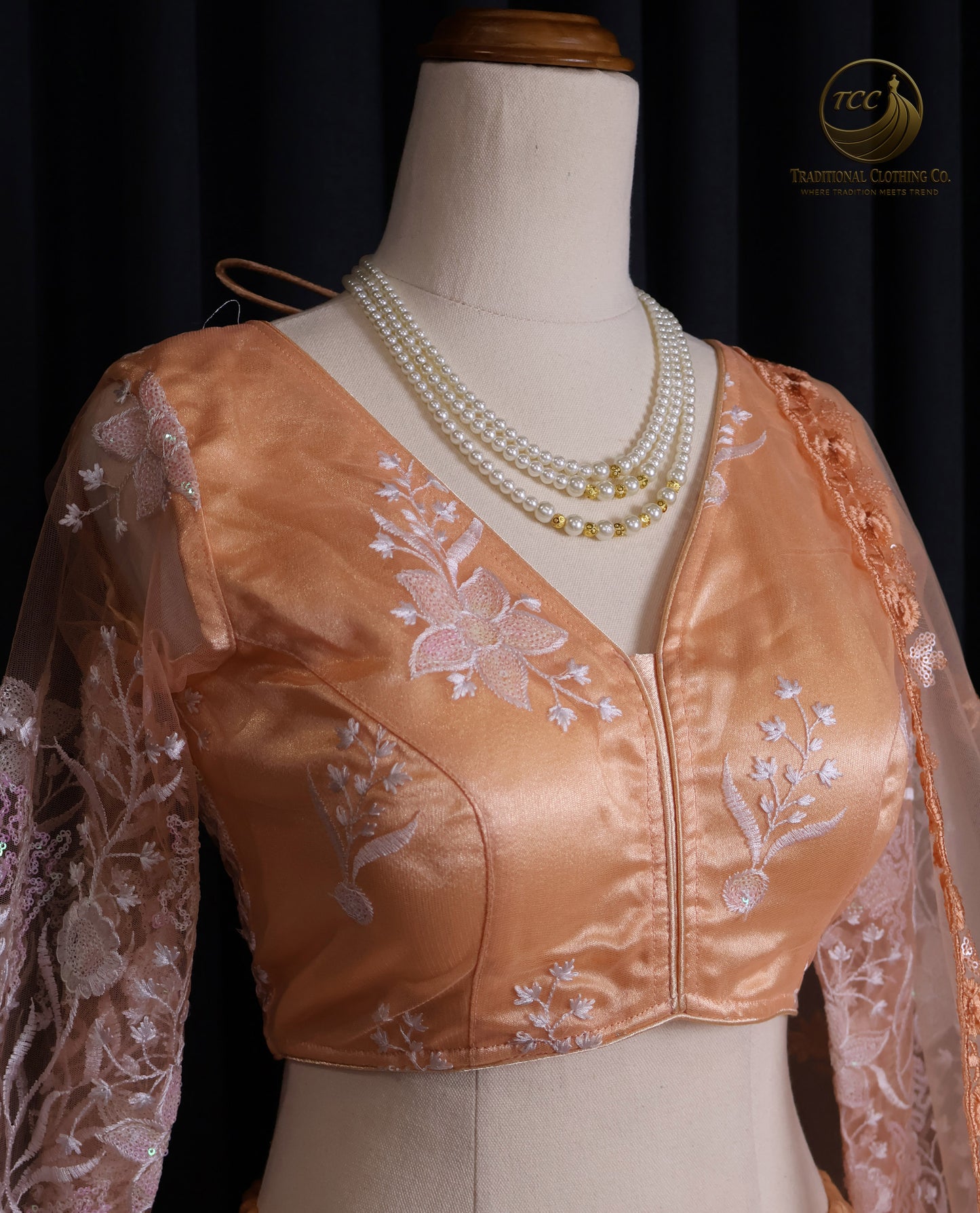 Elegant Peach Embroidered Lehenga Choli with Tassel Tie-Up Back & Sheer Dupatta – Festive & Traditional Wear