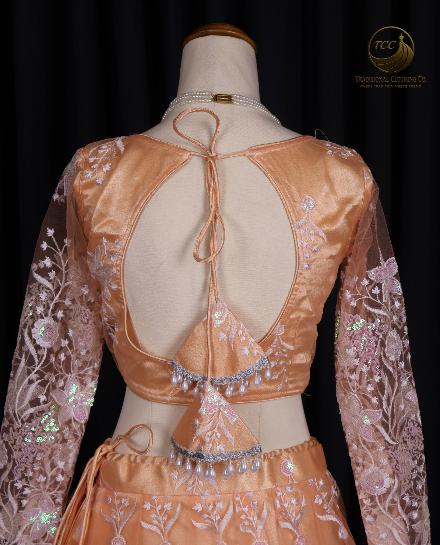 Elegant Peach Embroidered Lehenga Choli with Tassel Tie-Up Back & Sheer Dupatta – Festive & Traditional Wear