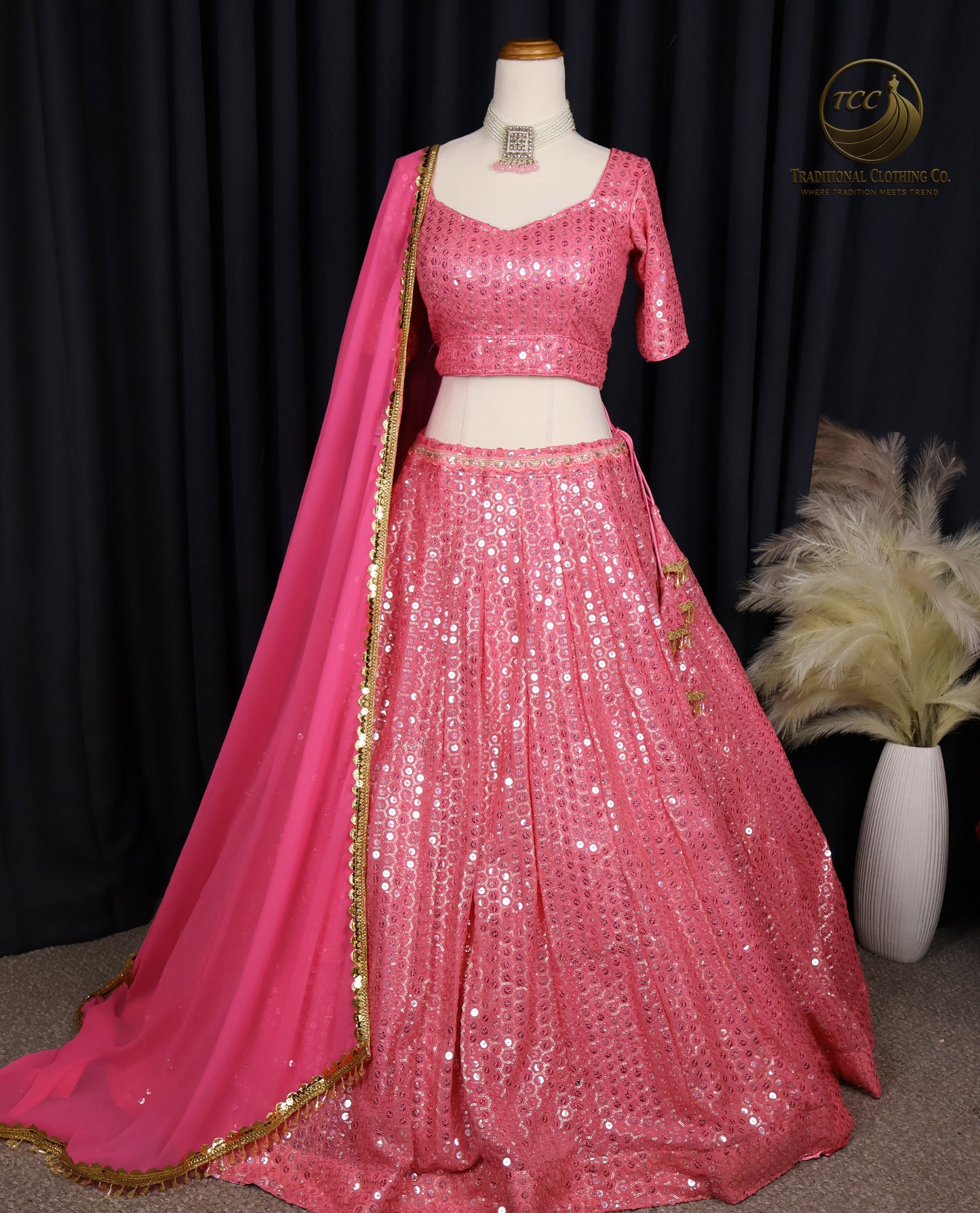 Stunning Light Coral Pink Embroidered Lehenga Choli with Crisscross Lace-Up Back & Sheer Dupatta – Festive & Traditional Wear