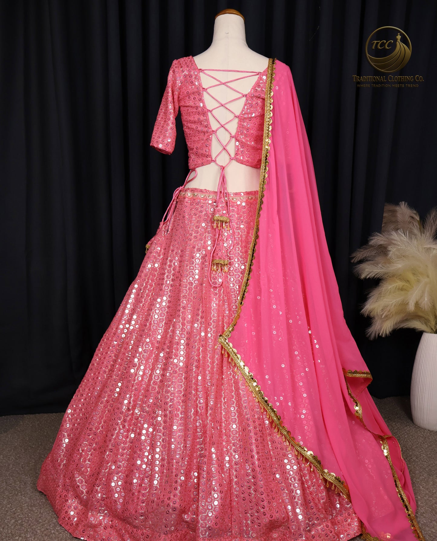 Stunning Light Coral Pink Embroidered Lehenga Choli with Crisscross Lace-Up Back & Sheer Dupatta – Festive & Traditional Wear