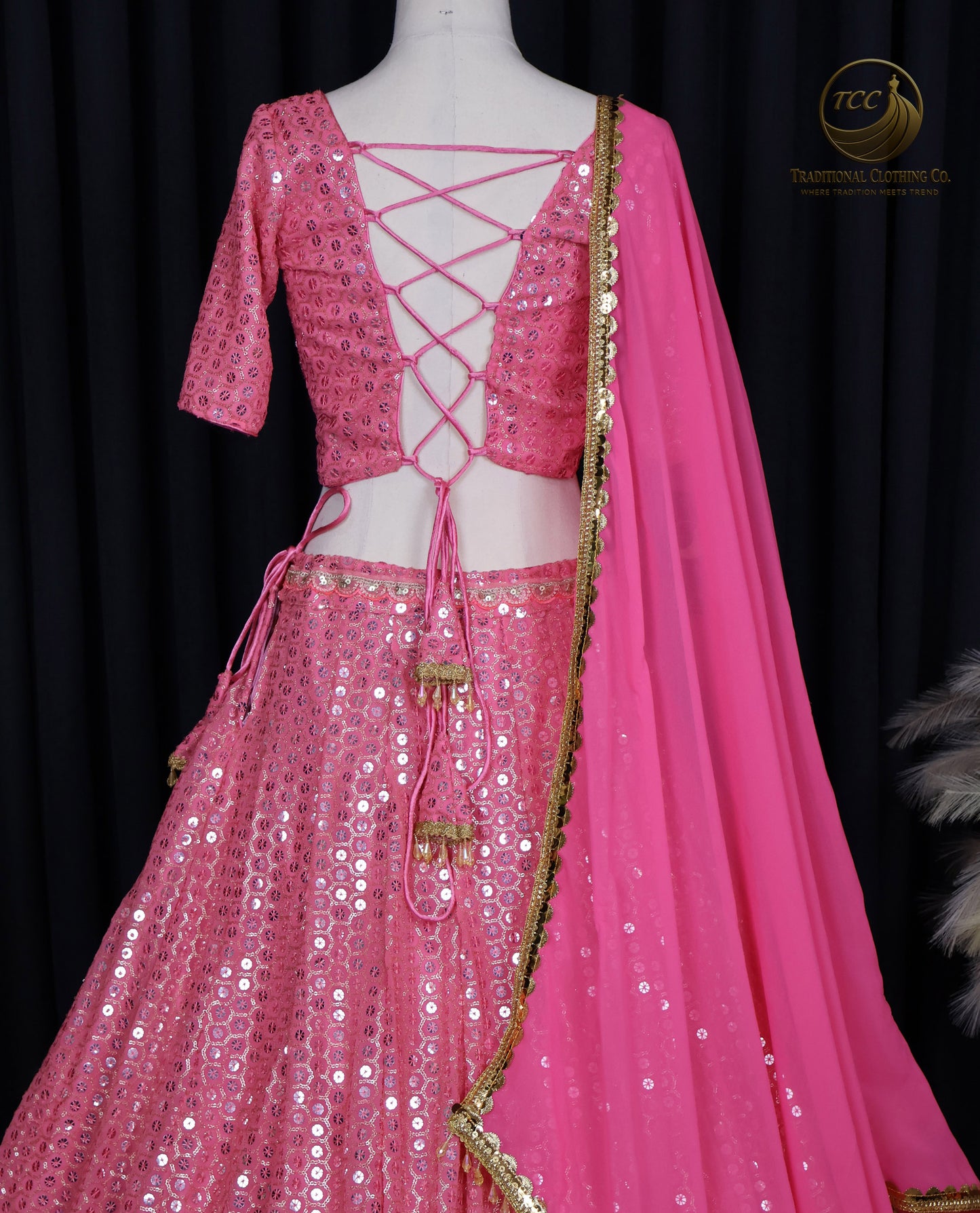 Stunning Light Coral Pink Embroidered Lehenga Choli with Crisscross Lace-Up Back & Sheer Dupatta – Festive & Traditional Wear