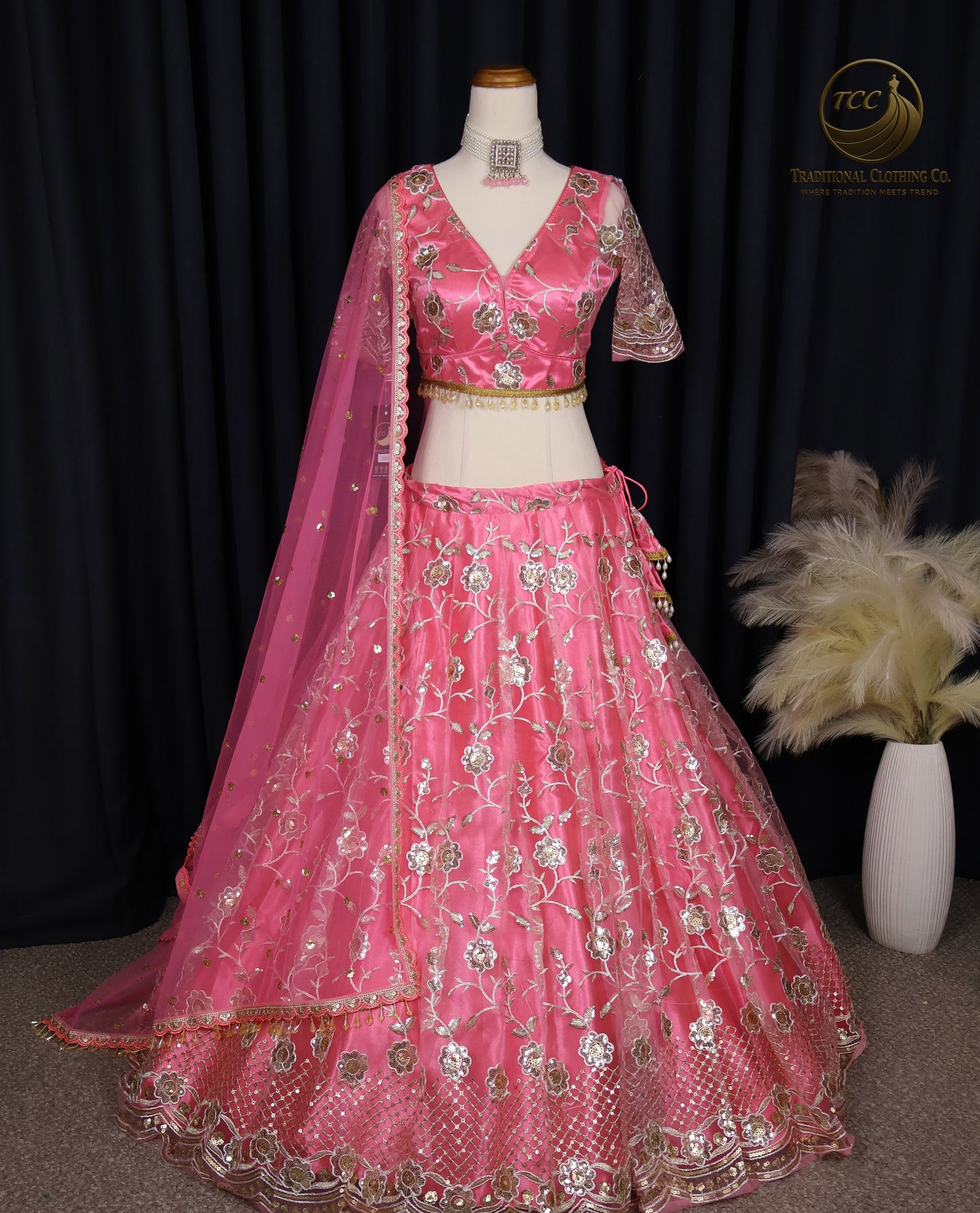 Radiant Pink Embroidered Lehenga Choli with Crisscross Tie-Up Back & Sheer Dupatta – Festive & Traditional Wear