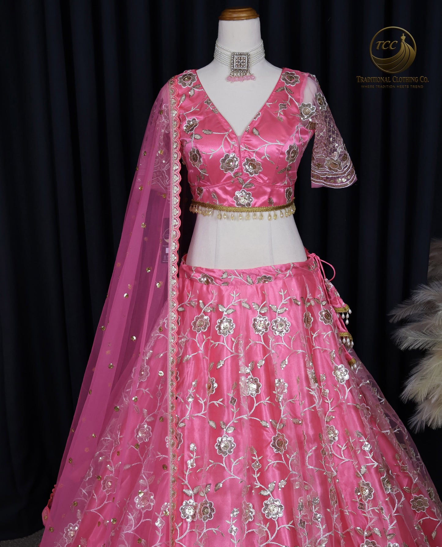 Radiant Pink Embroidered Lehenga Choli with Crisscross Tie-Up Back & Sheer Dupatta – Festive & Traditional Wear