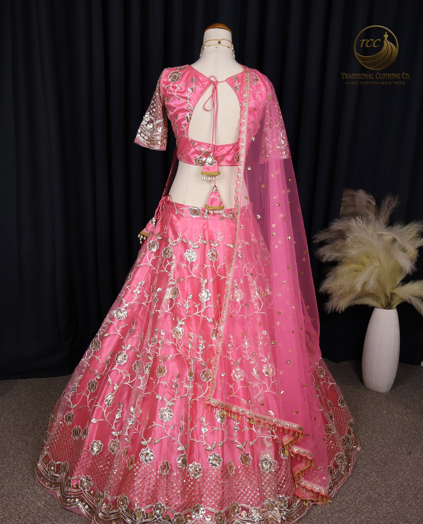 Radiant Pink Embroidered Lehenga Choli with Crisscross Tie-Up Back & Sheer Dupatta – Festive & Traditional Wear