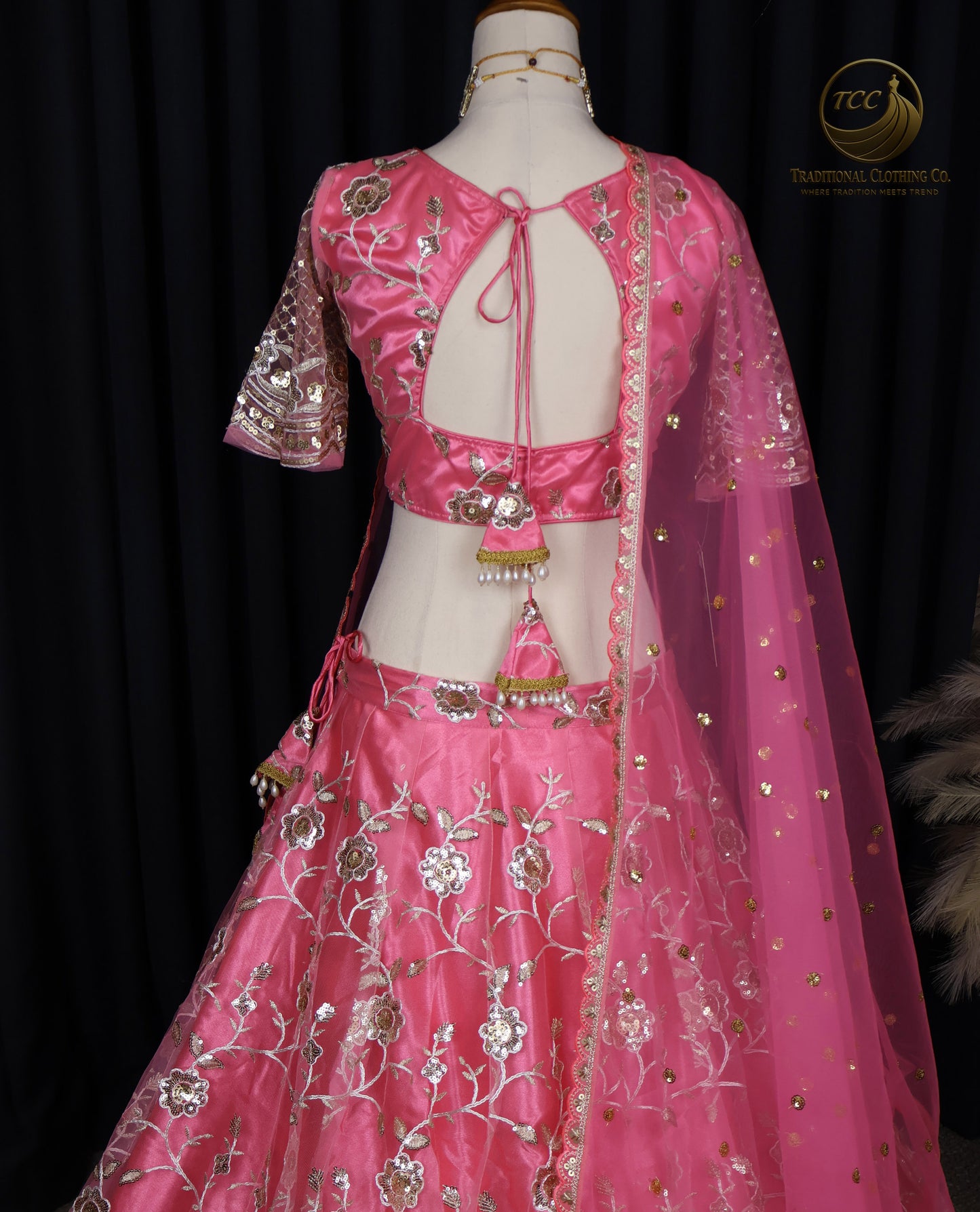 Radiant Pink Embroidered Lehenga Choli with Crisscross Tie-Up Back & Sheer Dupatta – Festive & Traditional Wear