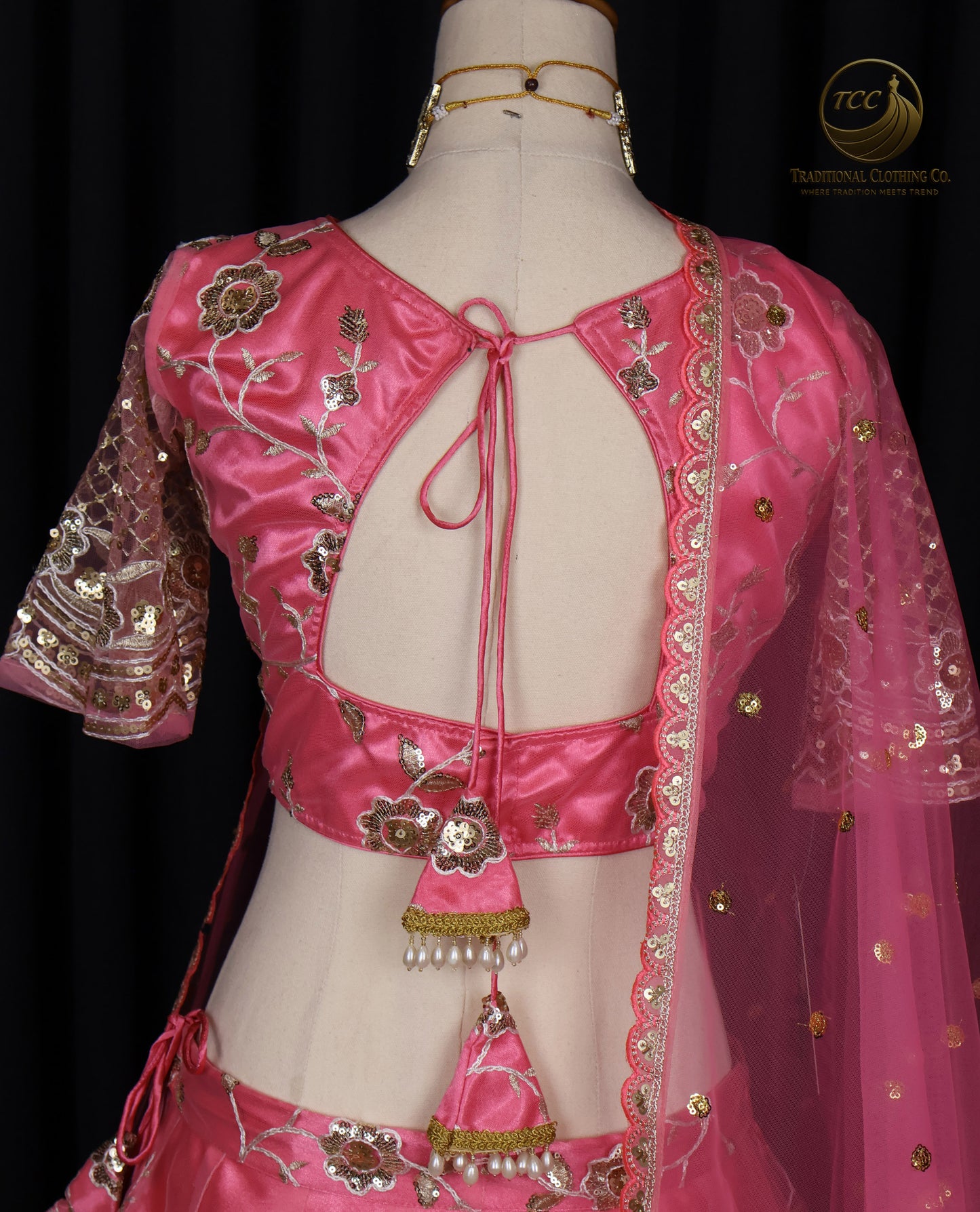 Radiant Pink Embroidered Lehenga Choli with Crisscross Tie-Up Back & Sheer Dupatta – Festive & Traditional Wear