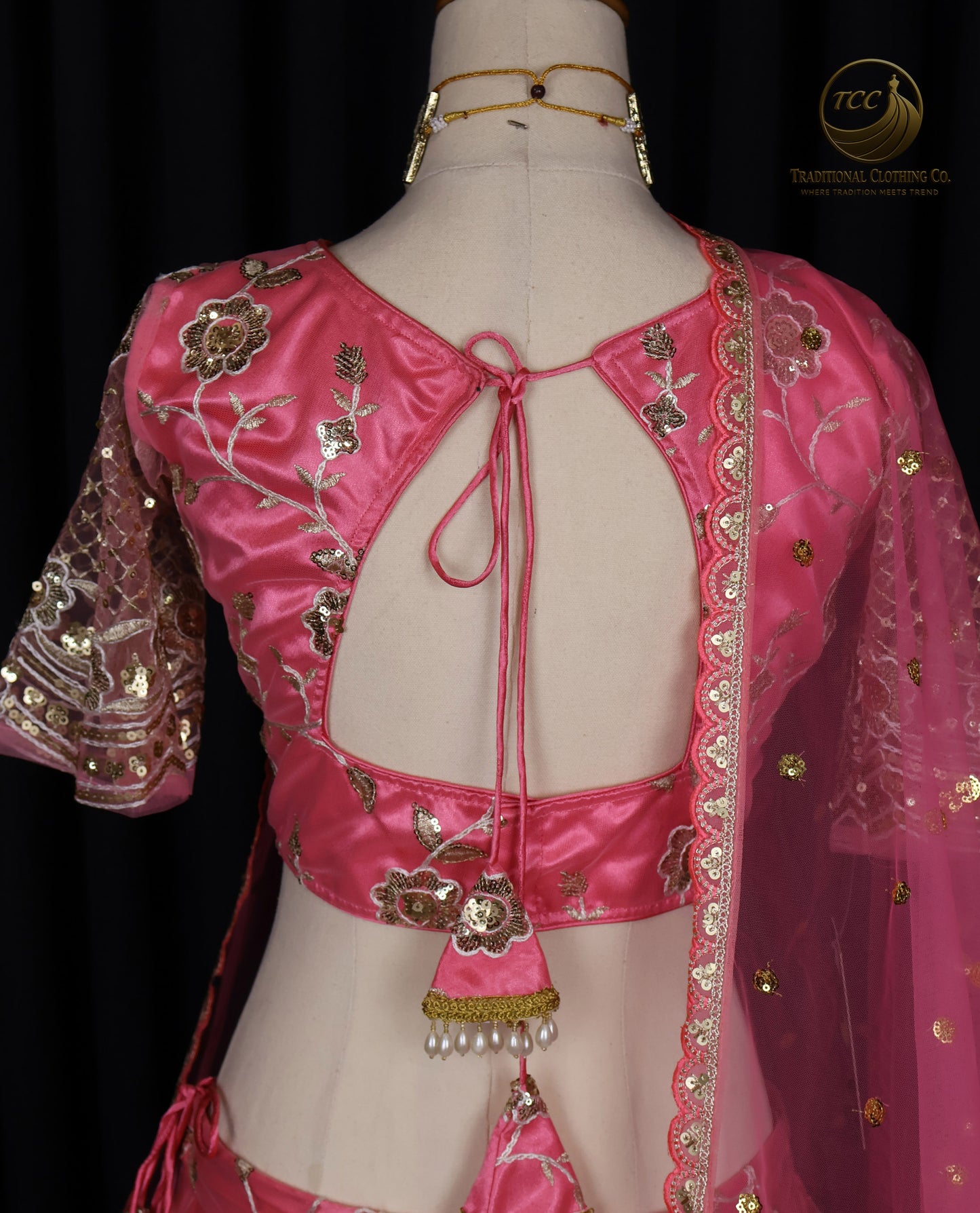 Radiant Pink Embroidered Lehenga Choli with Crisscross Tie-Up Back & Sheer Dupatta – Festive & Traditional Wear