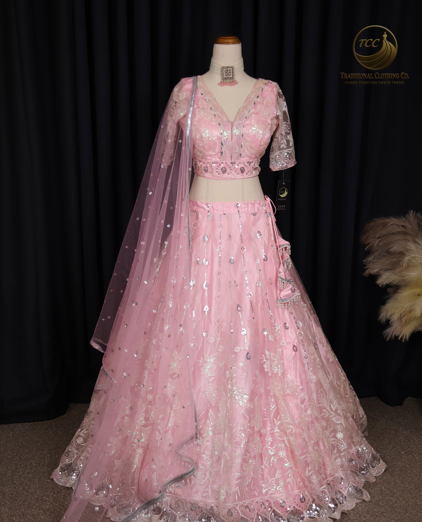 Exquisite Pink Embroidered Lehenga Choli with Crisscross Tie-Up Back & Sheer Dupatta – Festive & Traditional Wear