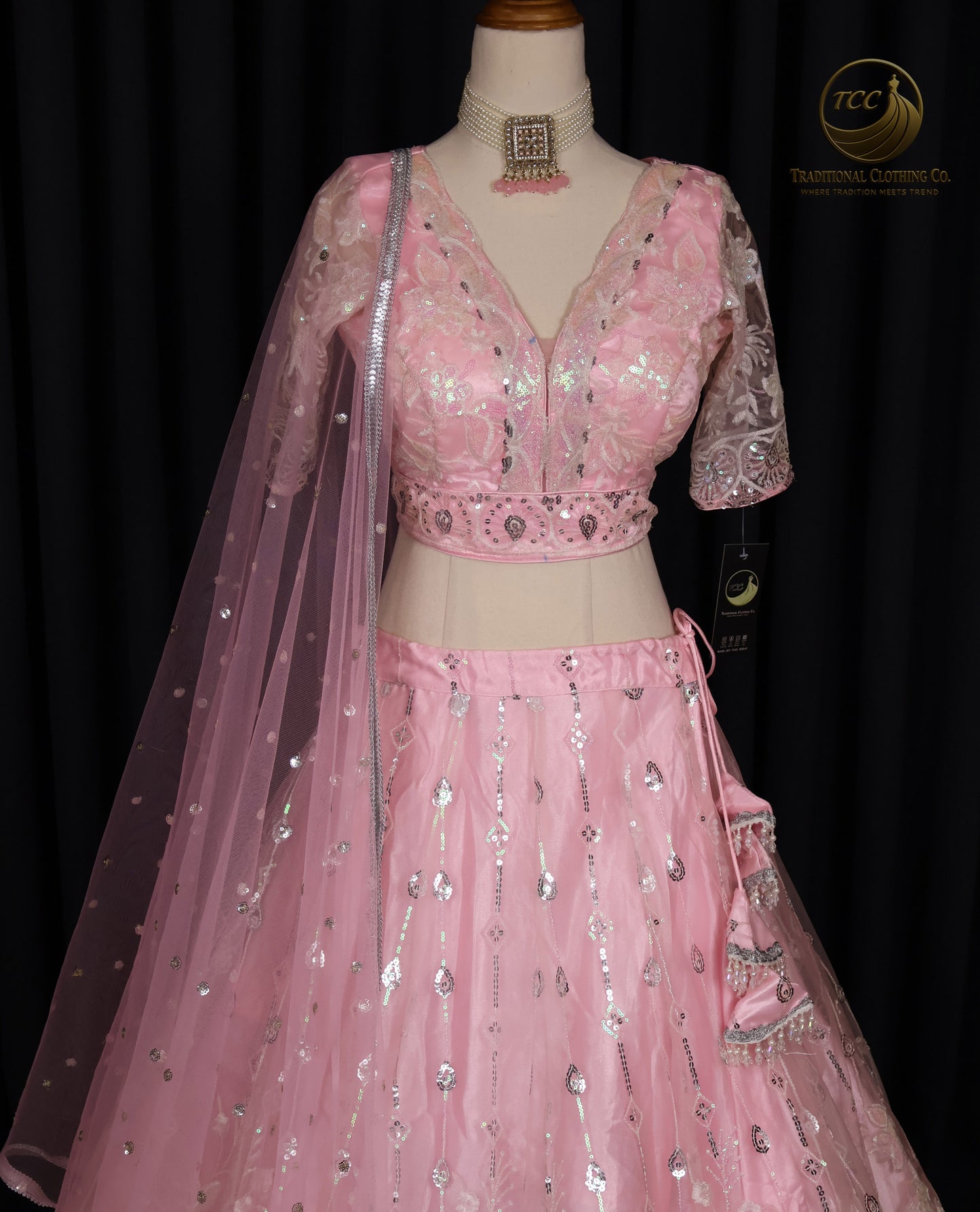 Exquisite Pink Embroidered Lehenga Choli with Crisscross Tie-Up Back & Sheer Dupatta – Festive & Traditional Wear