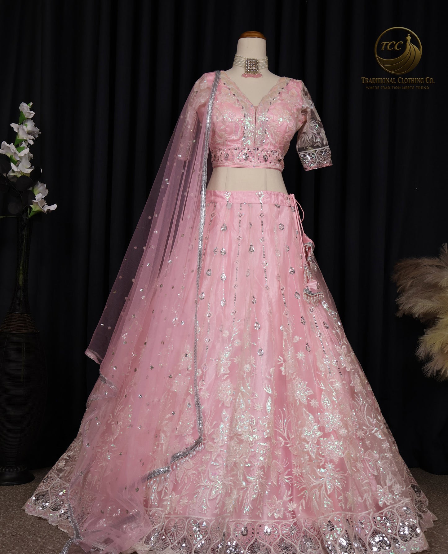 Exquisite Pink Embroidered Lehenga Choli with Crisscross Tie-Up Back & Sheer Dupatta – Festive & Traditional Wear