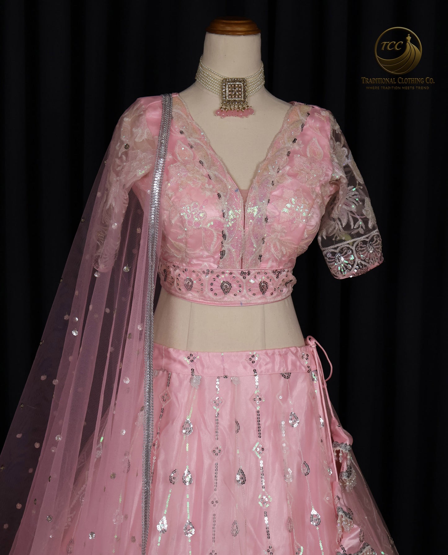 Exquisite Pink Embroidered Lehenga Choli with Crisscross Tie-Up Back & Sheer Dupatta – Festive & Traditional Wear