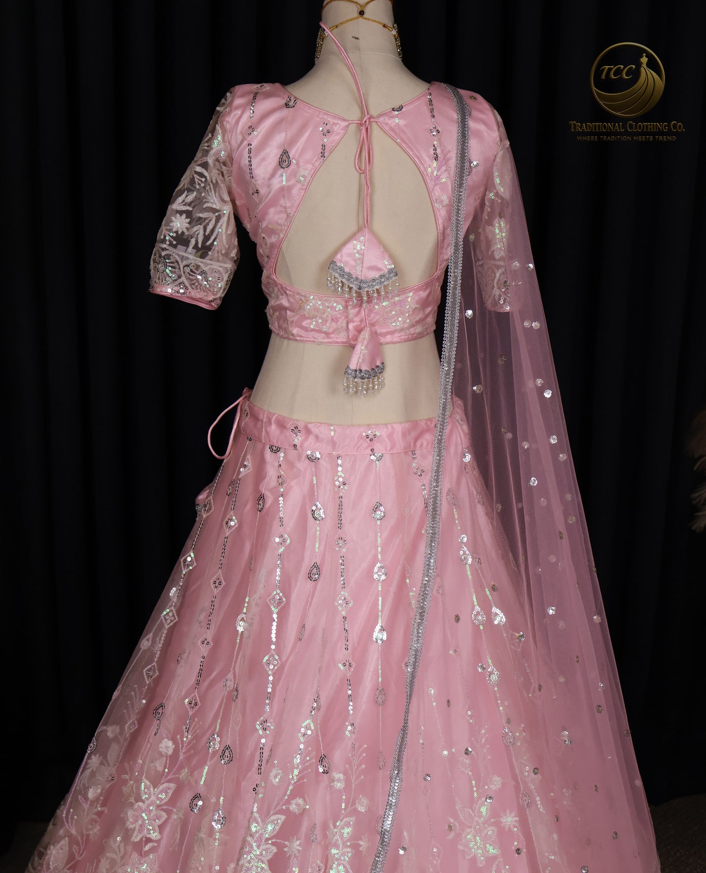 Exquisite Pink Embroidered Lehenga Choli with Crisscross Tie-Up Back & Sheer Dupatta – Festive & Traditional Wear