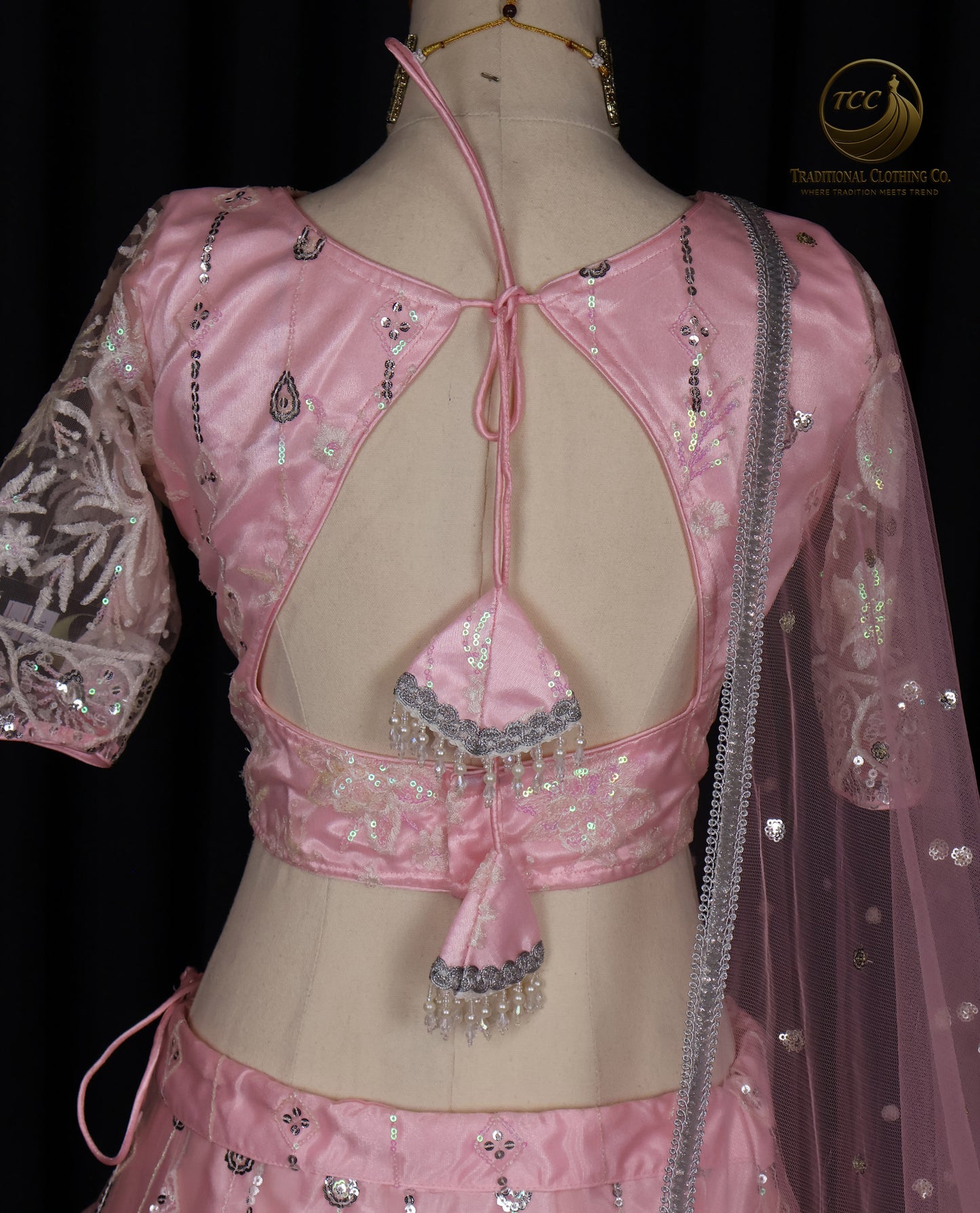 Exquisite Pink Embroidered Lehenga Choli with Crisscross Tie-Up Back & Sheer Dupatta – Festive & Traditional Wear