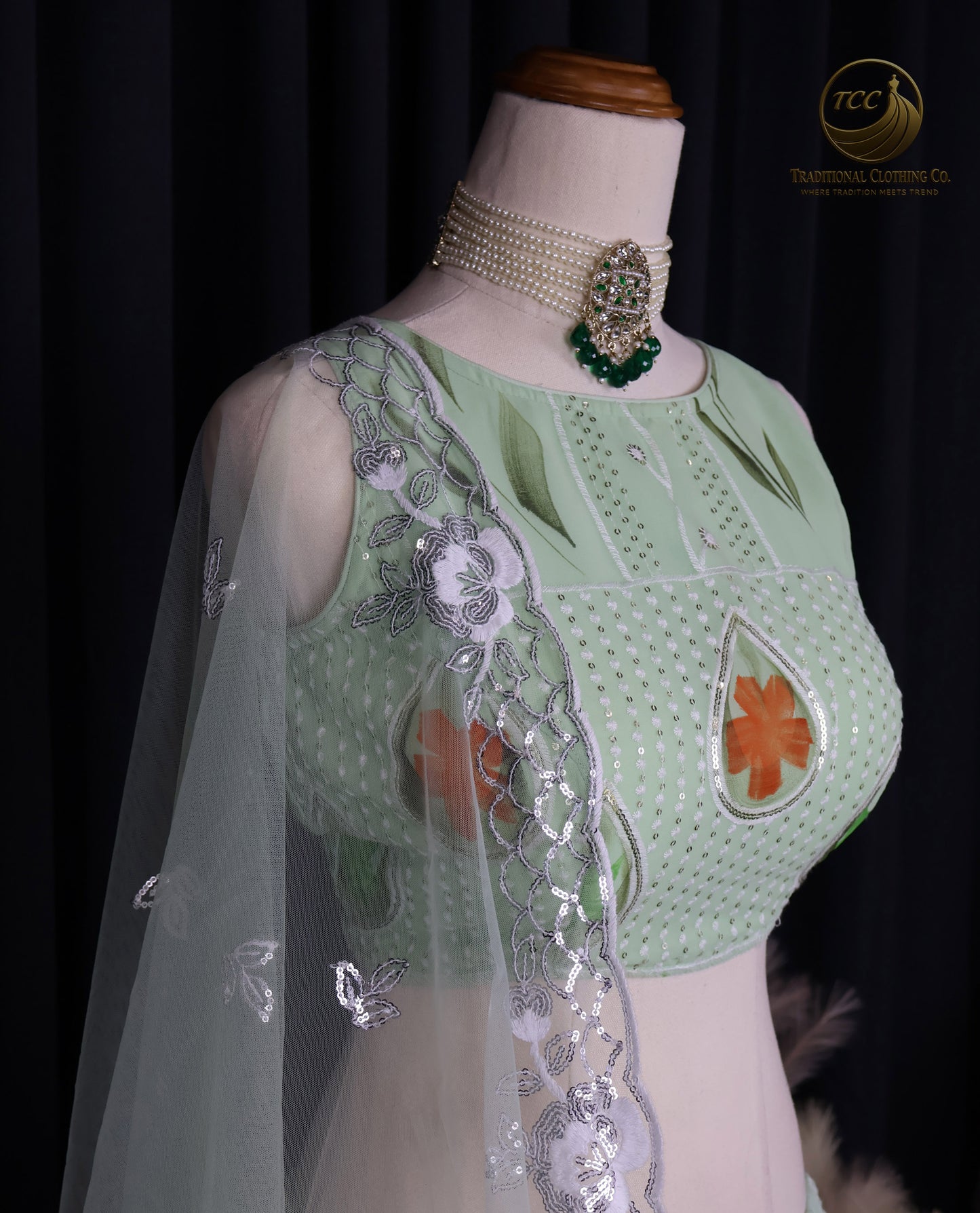 Graceful Light Green Embroidered Lehenga Choli with Floral Detailing & Sheer Dupatta – Festive & Traditional Wear
