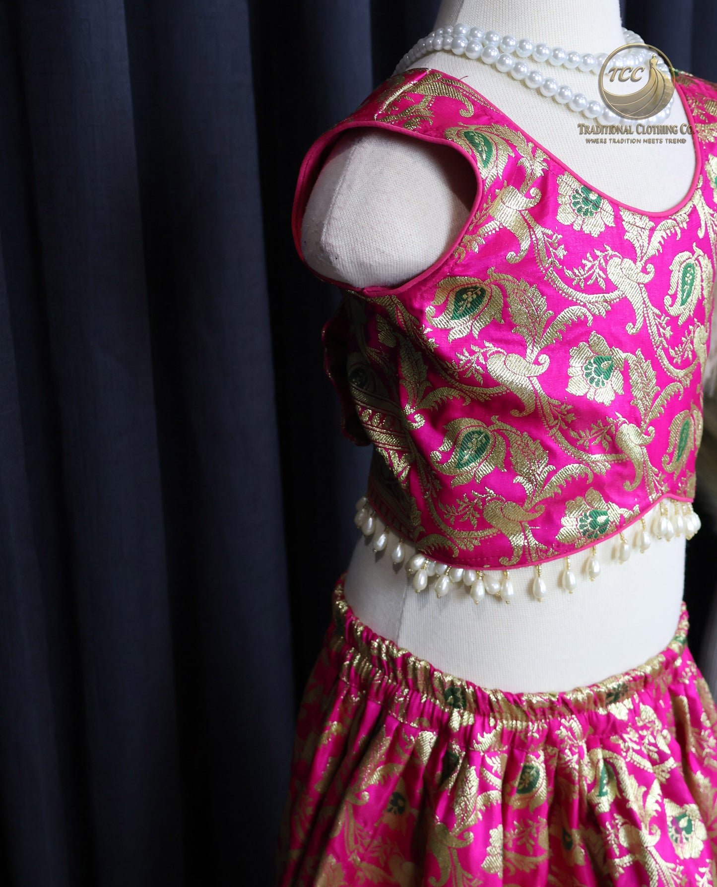 Vibrant Pink & Gold Floral Embroidered Lehenga Choli with Sleeveless Blouse – Festive & Traditional Wear