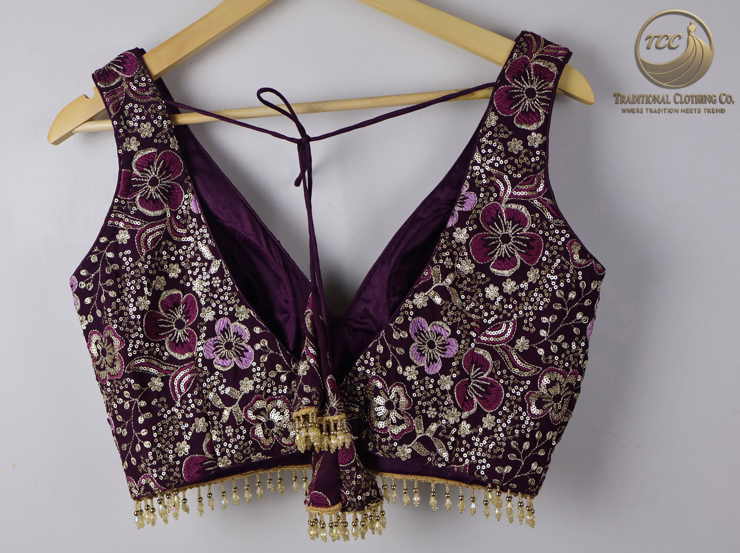 Deep Purple Embroidered Choli with Tassel Tie Closure & Beaded Hem – Modern Blouse for Festive & Cultural Wear | Boutique Edition
