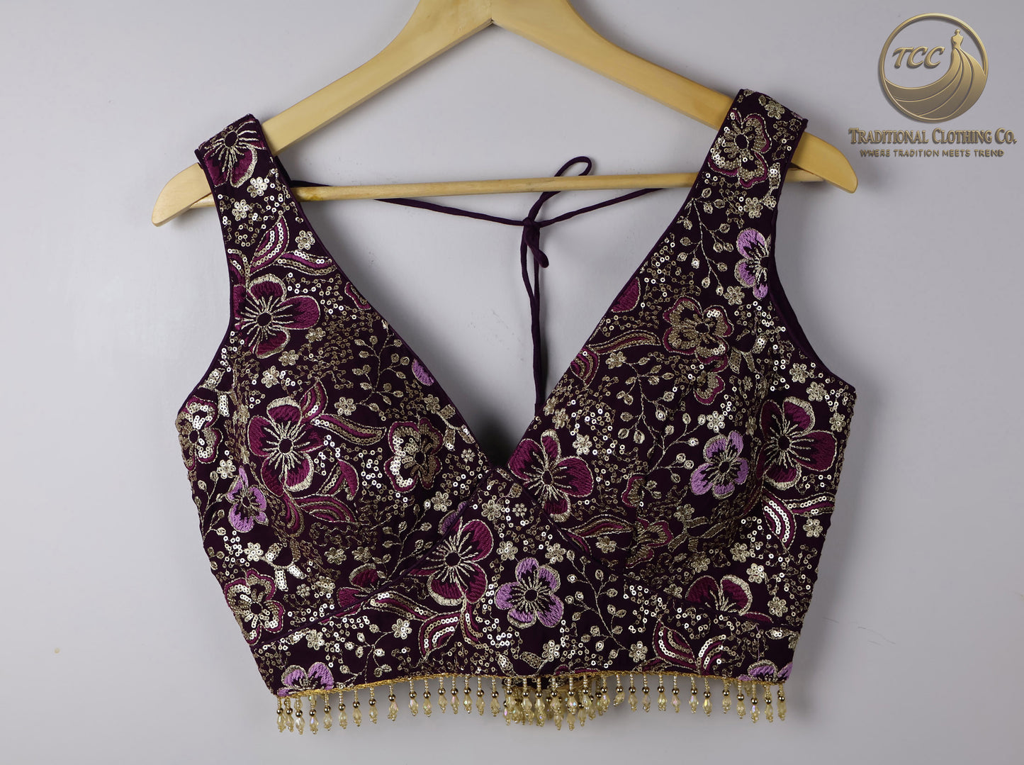 Deep Purple Embroidered Choli with Tassel Tie Closure & Beaded Hem – Modern Blouse for Festive & Cultural Wear | Boutique Edition