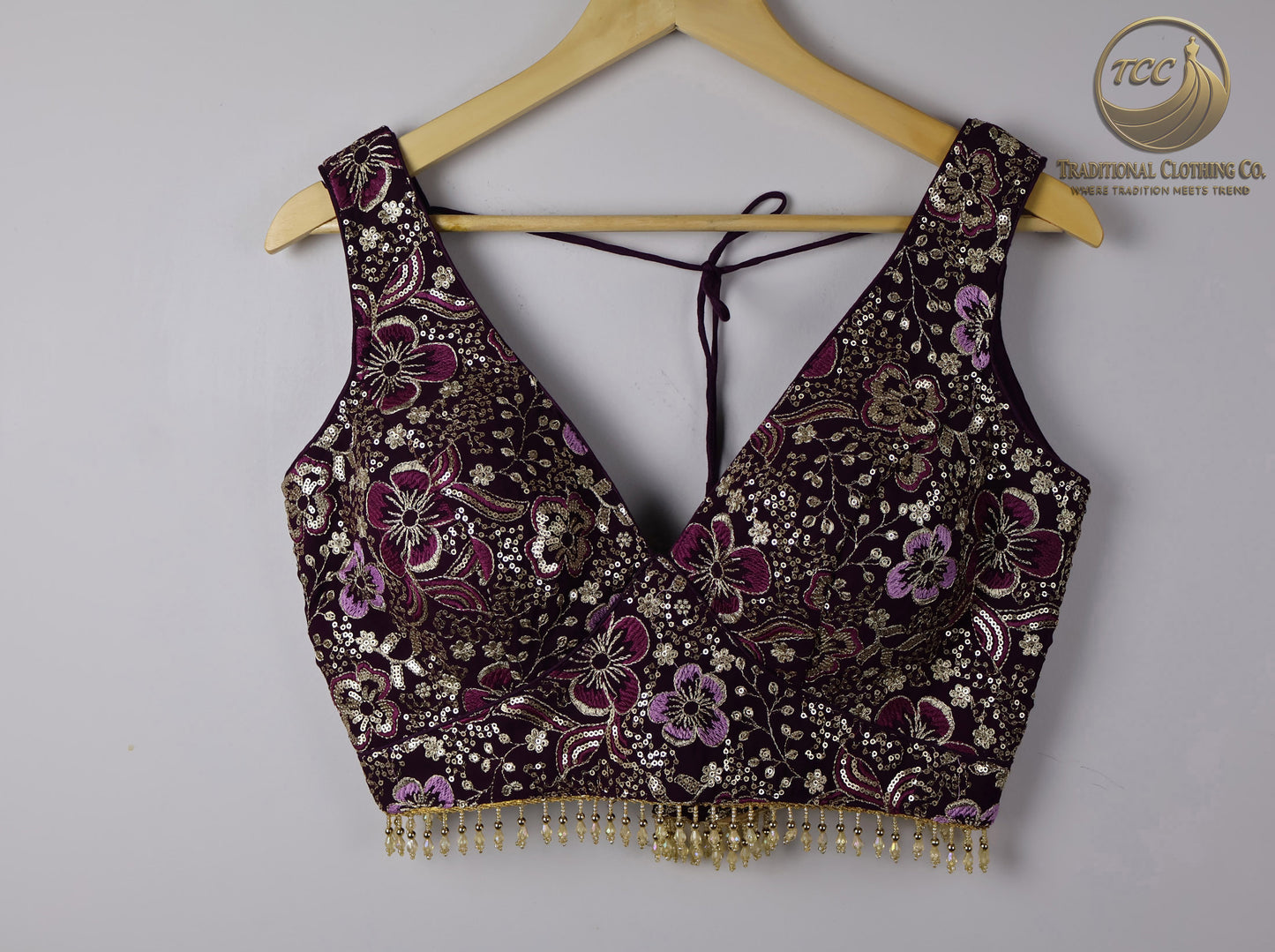 Deep Purple Embroidered Choli with Tassel Tie Closure & Beaded Hem – Modern Blouse for Festive & Cultural Wear | Boutique Edition