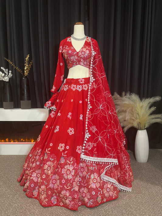RED BRIDAL THREAD AND SEQUIN EMBROIDERED LEHENGA WITH BOUTIQUE BLOUSE, SEQUIN EMBROIDERED DUPATTA AND MATCHING POTLI