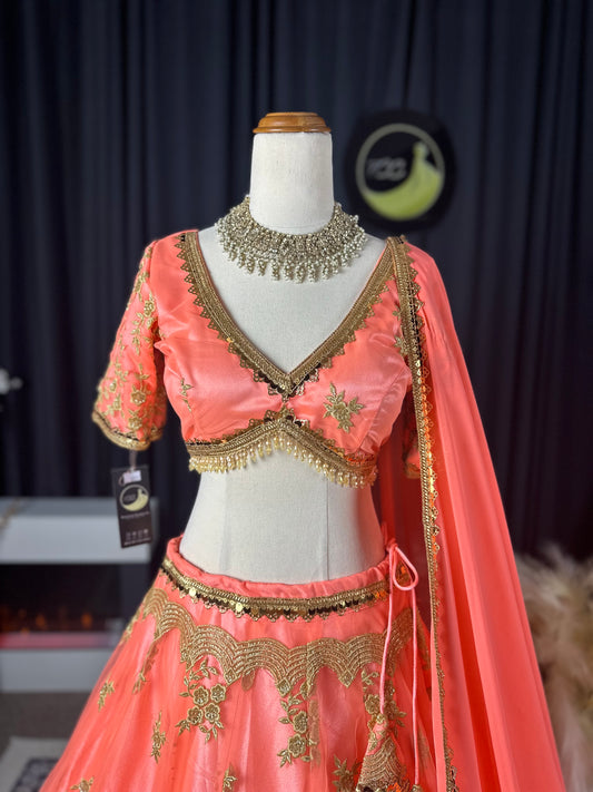 Boutique Peach Pink Embroidered Silk Lehenga Set with Gold Detailing