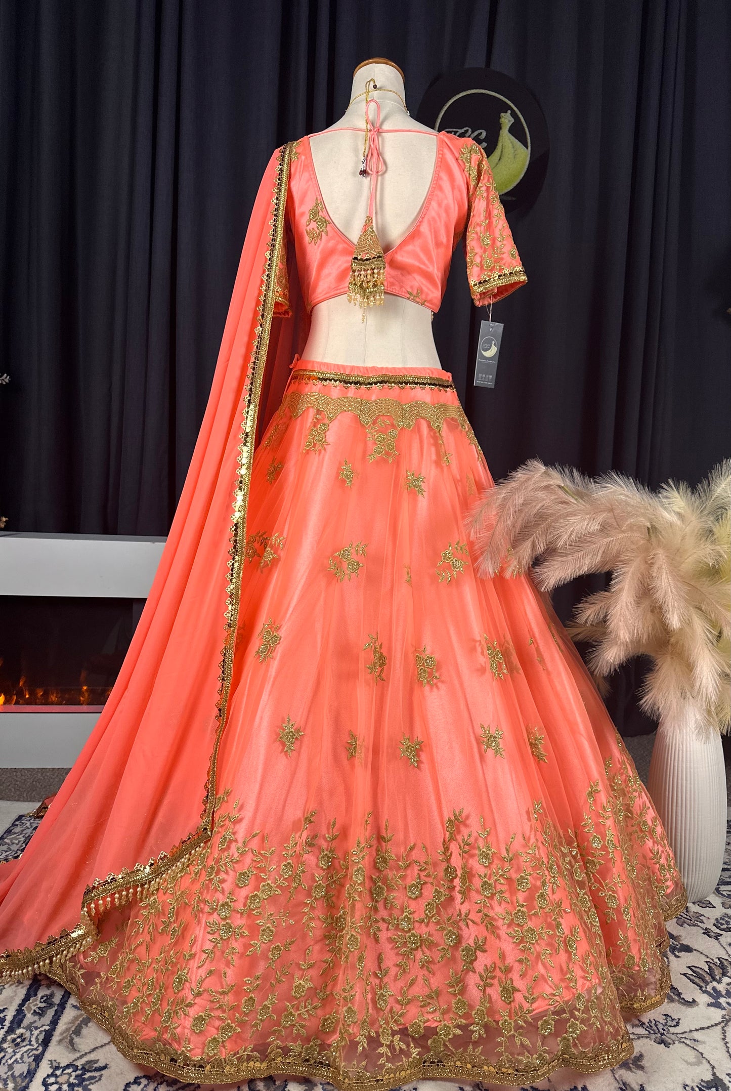 Boutique Peach Pink Embroidered Silk Lehenga Set with Gold Detailing