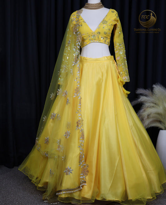Yellow Floral Embroidered Lehenga Choli with Sheer Dupatta – Elegant Traditional Wear