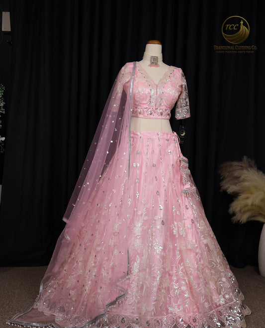 Exquisite Pink Embroidered Lehenga Choli with Crisscross Tie-Up Back & Sheer Dupatta – Festive & Traditional Wear
