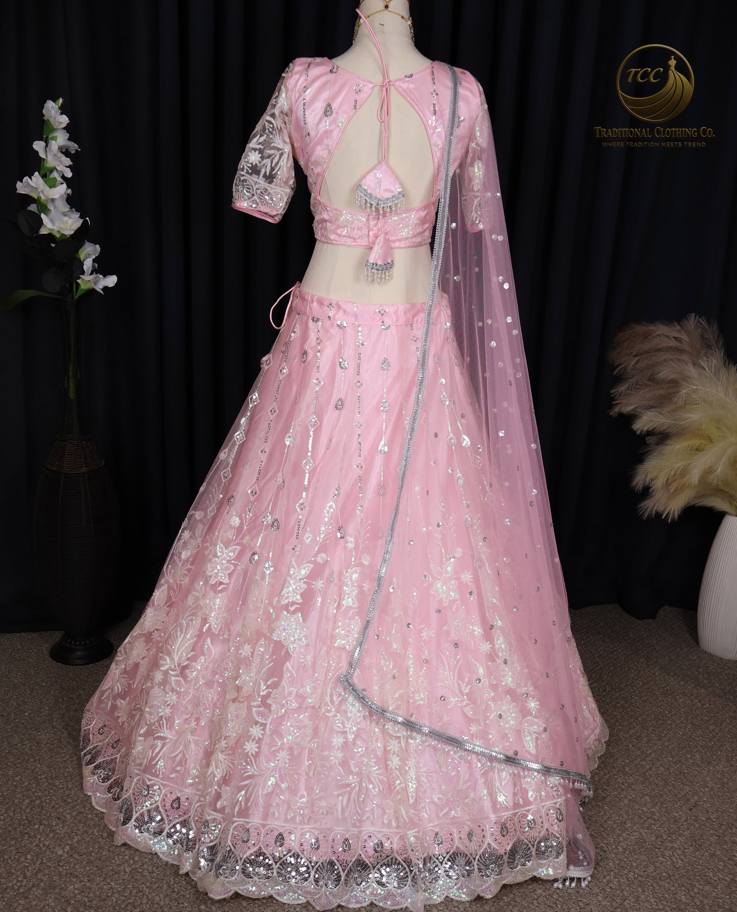 Exquisite Pink Embroidered Lehenga Choli with Crisscross Tie-Up Back & Sheer Dupatta – Festive & Traditional Wear
