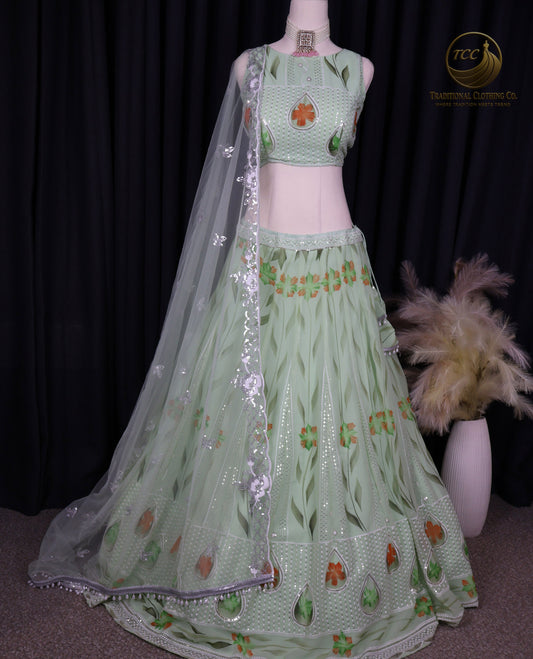 Graceful Light Green Embroidered Lehenga Choli with Floral Detailing & Sheer Dupatta – Festive & Traditional Wear