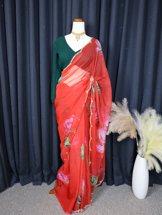 Green blouse and red saree